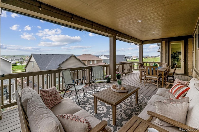 deck featuring outdoor lounge area