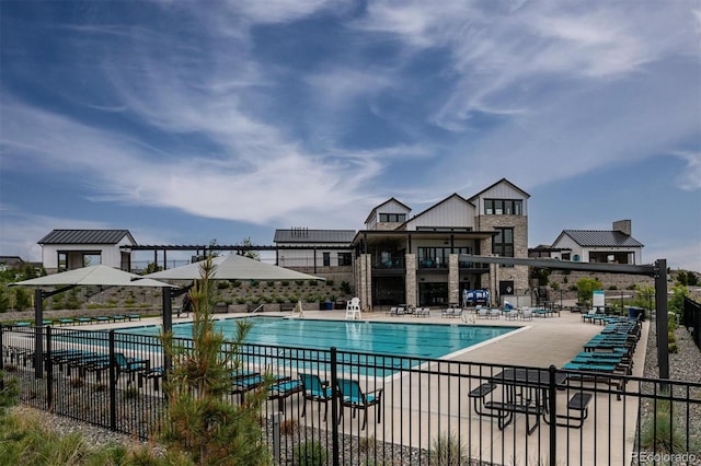 view of swimming pool featuring a patio area