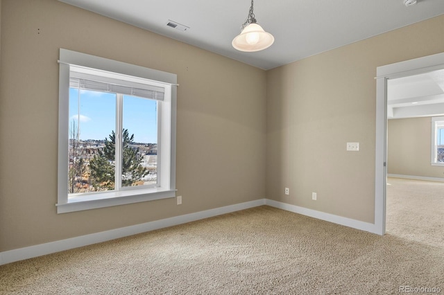 view of carpeted spare room