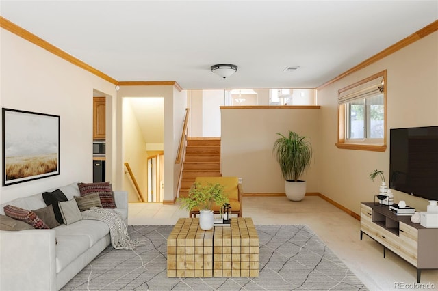 3765 S Depew St, Denver, CO 80235 - living area with stairway, crown molding, light colored carpet, and baseboards
