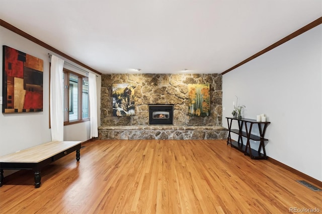 1998 S Harlan Ct, Lakewood, CO 80227 - living room with wood finished floors, a fireplace, and crown molding