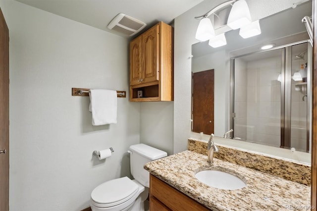 1998 S Harlan Ct, Lakewood, CO 80227 - full bath featuring toilet, vanity, and a shower stall