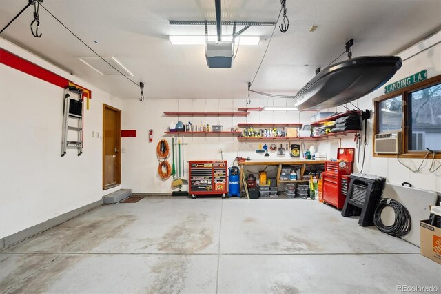 1998 S Harlan Ct, Lakewood, CO 80227 - garage featuring a garage door opener