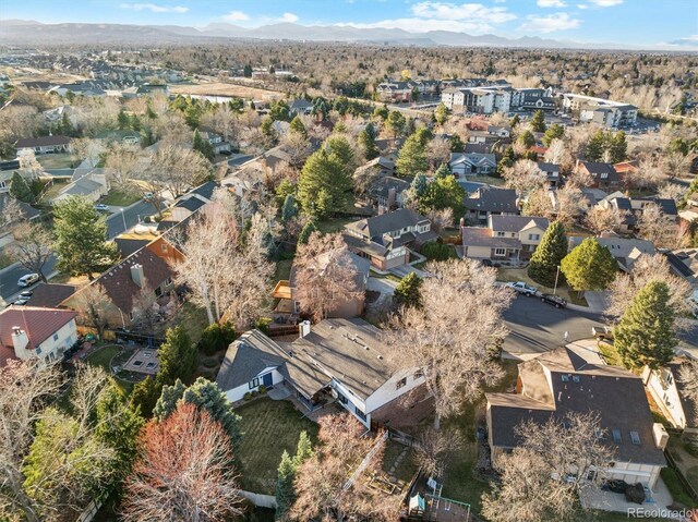 1998 S Harlan Ct, Lakewood, CO 80227 - aerial view of property and surrounding area with nearby suburban area and a mountainous background