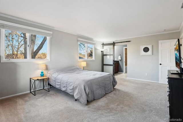 1998 S Harlan Ct, Lakewood, CO 80227 - bedroom featuring ornamental molding, a barn door, carpet flooring, and baseboards