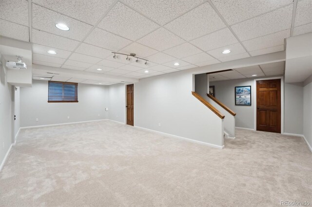 1998 S Harlan Ct, Lakewood, CO 80227 - finished basement featuring carpet, recessed lighting, a paneled ceiling, baseboards, and stairway