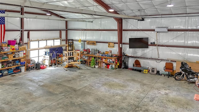 garage with a workshop area