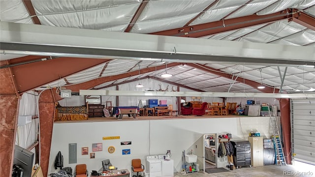 garage featuring washer and clothes dryer