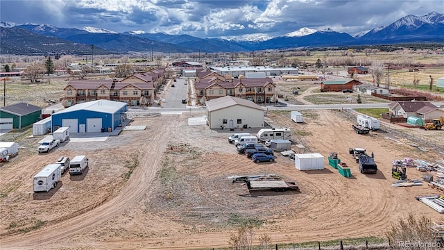 drone / aerial view featuring a mountain view