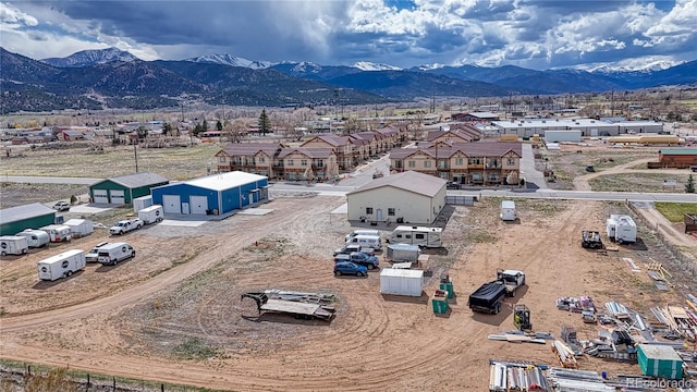 drone / aerial view featuring a mountain view