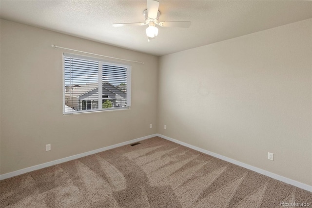 10414 Declaration Dr, Colorado Springs, CO 80925 - carpeted spare room featuring ceiling fan and baseboards