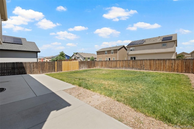 10414 Declaration Dr, Colorado Springs, CO 80925 - fenced backyard with a residential view and a patio area