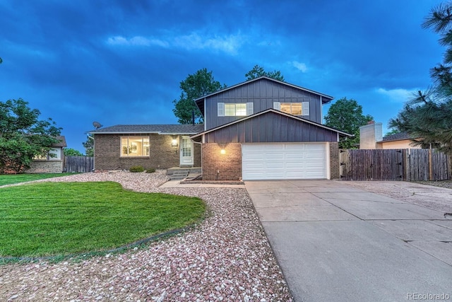 15918 E Flora Pl, Aurora, CO 80013 - view of front of property with driveway and brick siding