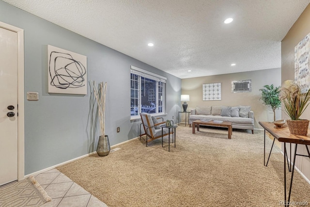 15918 E Flora Pl, Aurora, CO 80013 - living area featuring light colored carpet, a textured ceiling, recessed lighting, light tile patterned floors, and baseboards