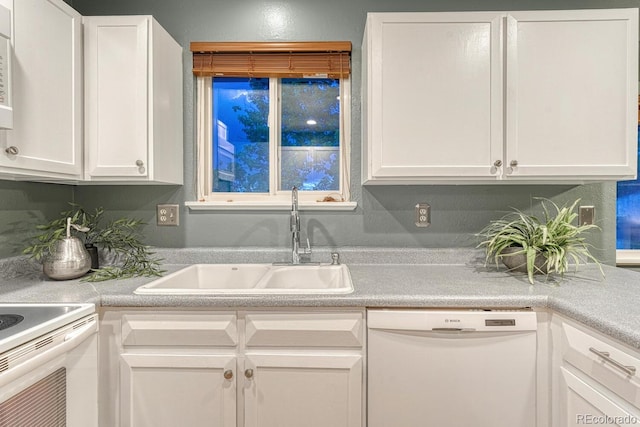 15918 E Flora Pl, Aurora, CO 80013 - kitchen featuring white appliances, a sink, white cabinetry, and light countertops