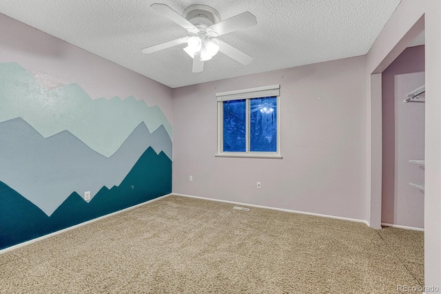 15918 E Flora Pl, Aurora, CO 80013 - unfurnished room featuring carpet floors, a textured ceiling, a ceiling fan, and baseboards