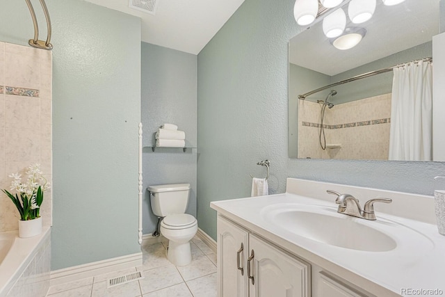 15918 E Flora Pl, Aurora, CO 80013 - bathroom with toilet, tile patterned floors, vanity, baseboards, and a textured wall