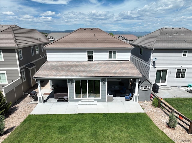 2198 Broadleaf Loop, Castle Rock, CO 80109 - rear view of property with a patio area, a tiled roof, and entry steps
