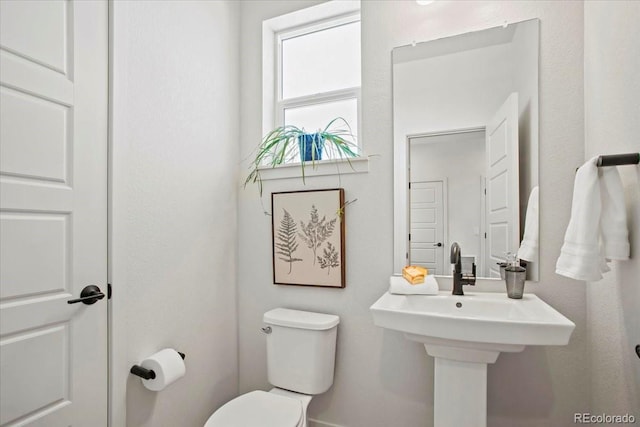 16637 Shoshone St, Broomfield, CO 80023 - half bathroom featuring toilet and a sink