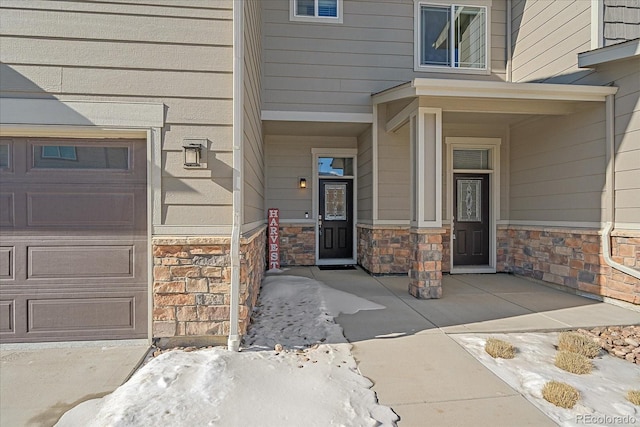 property entrance with a garage