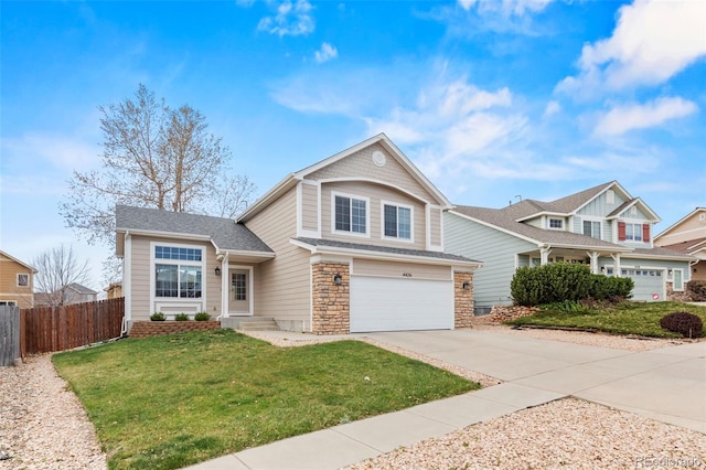 4426 Crow Creek Dr, Colorado Springs, CO 80922 - view of front of house featuring an attached garage, driveway, and stone siding