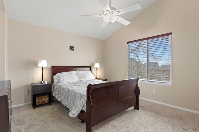 4426 Crow Creek Dr, Colorado Springs, CO 80922 - bedroom featuring light carpet, vaulted ceiling, baseboards, and a ceiling fan