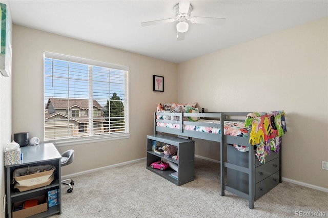 4426 Crow Creek Dr, Colorado Springs, CO 80922 - carpeted bedroom with baseboards and a ceiling fan