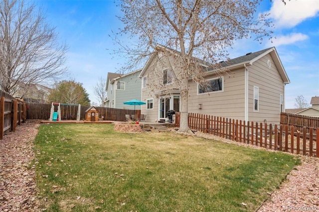 4426 Crow Creek Dr, Colorado Springs, CO 80922 - rear view of property featuring a playground