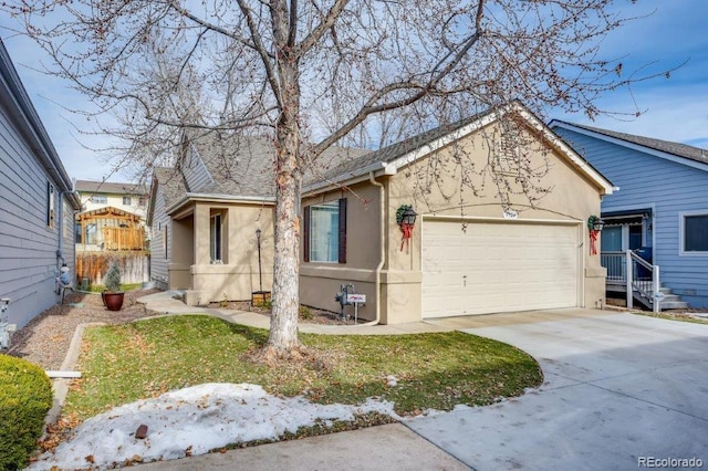 ranch-style home with a garage