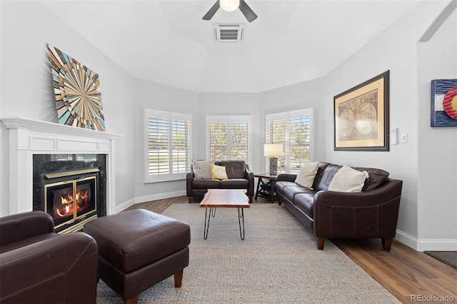 2370 W 152nd Ave, Broomfield, CO 80023 - living room featuring wood finished floors, healthy amount of natural light, and ceiling fan