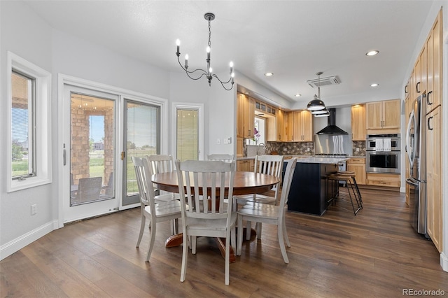 2370 W 152nd Ave, Broomfield, CO 80023 - dining space featuring dark wood-style flooring, a chandelier, and recessed lighting