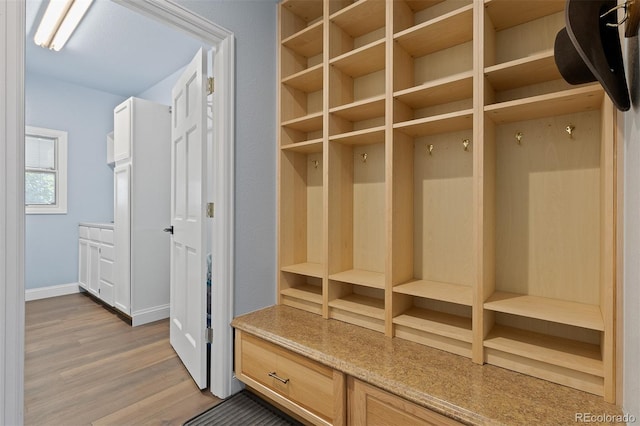 2370 W 152nd Ave, Broomfield, CO 80023 - mudroom with light wood finished floors and baseboards