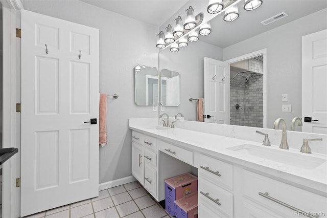 2370 W 152nd Ave, Broomfield, CO 80023 - full bath featuring a shower stall, double vanity, and tile patterned floors