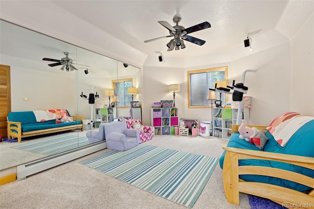 2370 W 152nd Ave, Broomfield, CO 80023 - playroom featuring carpet, a ceiling fan, and baseboard heating