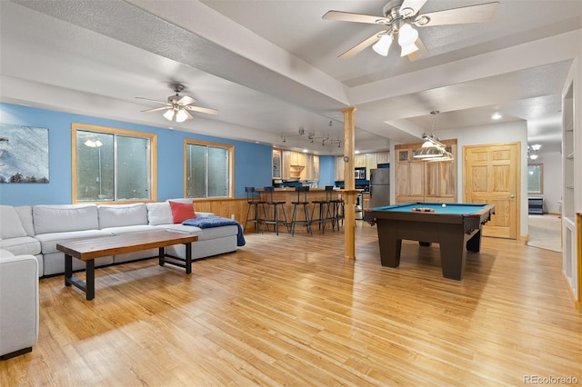 2370 W 152nd Ave, Broomfield, CO 80023 - rec room with track lighting, ceiling fan, and light wood-style floors