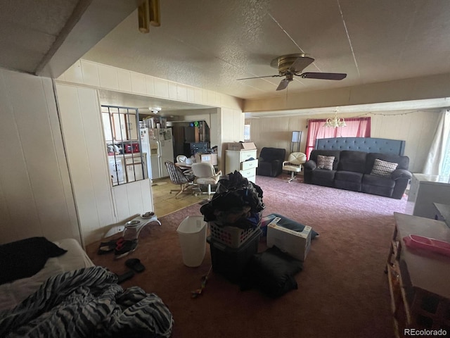 189 13th Ave, Cedaredge, CO 81413 - living area featuring a healthy amount of sunlight, carpet, and a ceiling fan