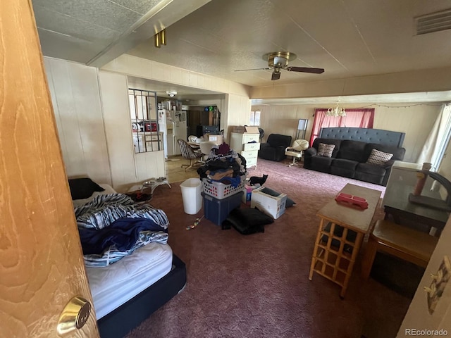 189 13th Ave, Cedaredge, CO 81413 - carpeted living room featuring visible vents and ceiling fan