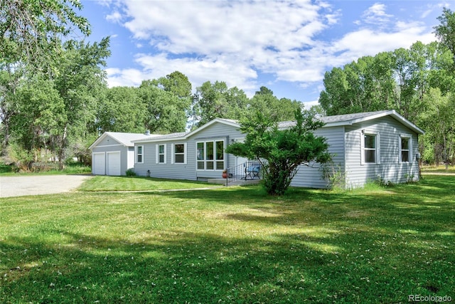 910 W Main St, Buena Vista, CO 81211 - view of front of home with a front yard and a garage