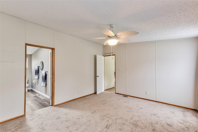910 W Main St, Buena Vista, CO 81211 - unfurnished room featuring carpet, a ceiling fan, and a textured ceiling
