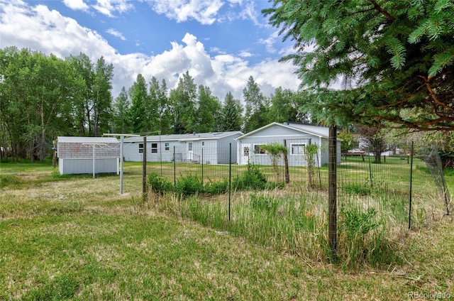 910 W Main St, Buena Vista, CO 81211 - view of yard featuring a storage unit and view of scattered trees