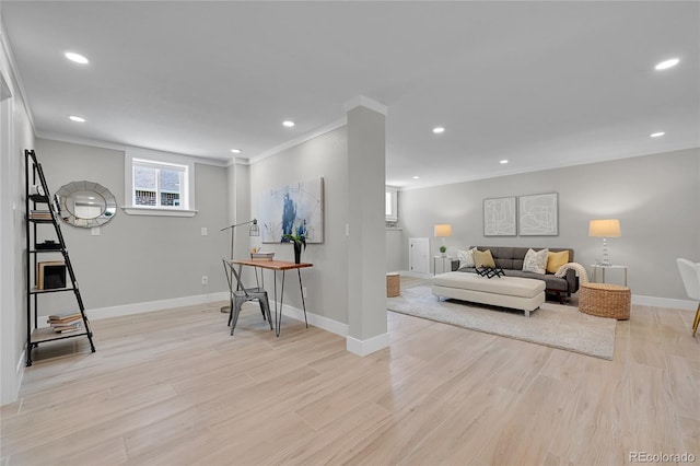 living area with crown molding, recessed lighting, baseboards, and light wood-type flooring