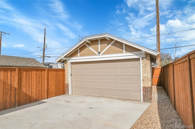 garage with fence
