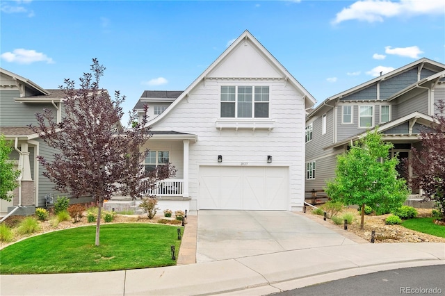 2027 Vallejo Loop, Broomfield, CO 80023 - craftsman house featuring driveway, an attached garage, and a front lawn
