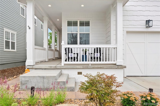 2027 Vallejo Loop, Broomfield, CO 80023 - property entrance with covered porch and a garage