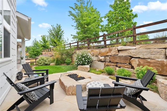 2027 Vallejo Loop, Broomfield, CO 80023 - view of patio / terrace with a fire pit and a fenced backyard