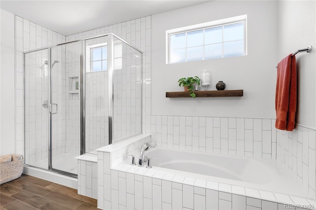 2027 Vallejo Loop, Broomfield, CO 80023 - full bathroom featuring a stall shower and a garden tub