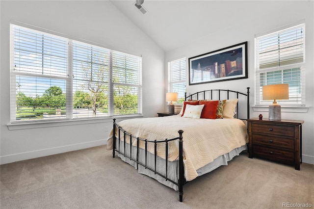 2027 Vallejo Loop, Broomfield, CO 80023 - bedroom featuring light carpet, lofted ceiling, and baseboards