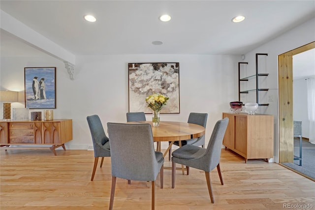 dining area with recessed lighting and light wood finished floors