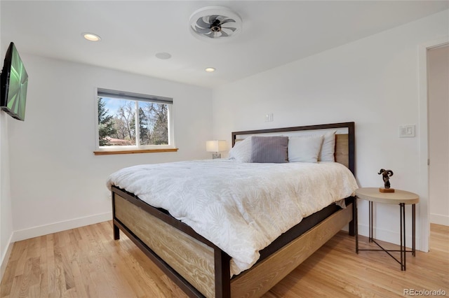 bedroom featuring recessed lighting, light wood finished floors, and baseboards