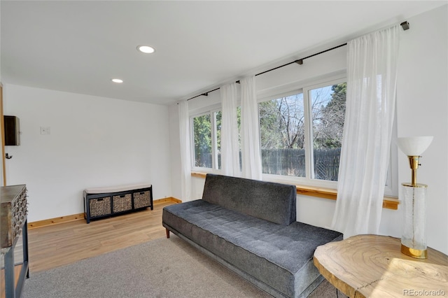 sitting room featuring recessed lighting, baseboards, and wood finished floors